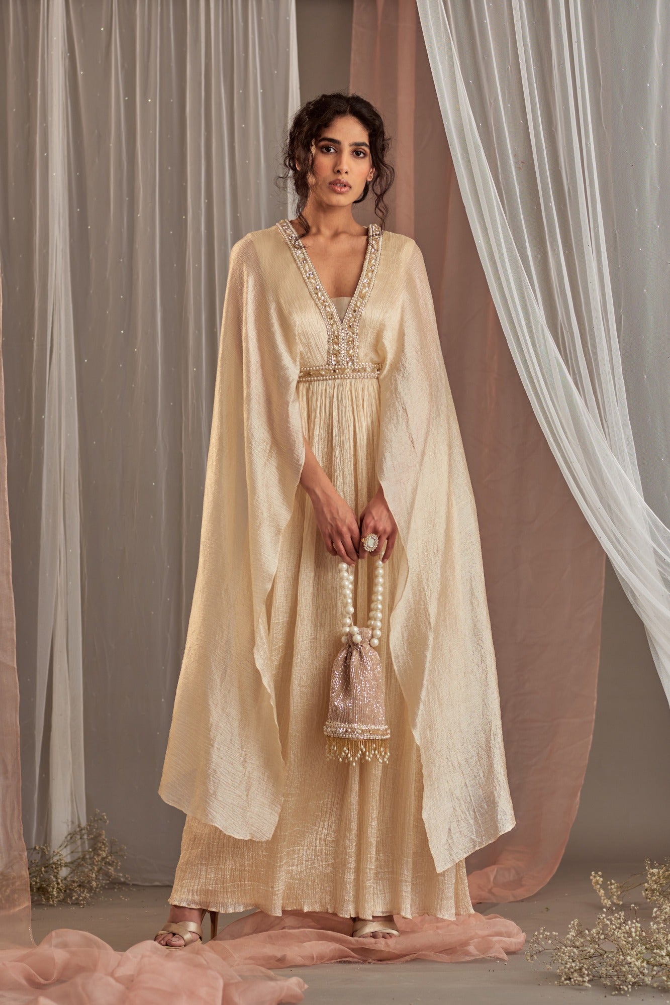 Buy Women's Ivory Floor Length Drape Gown | Nidhika Shekhar