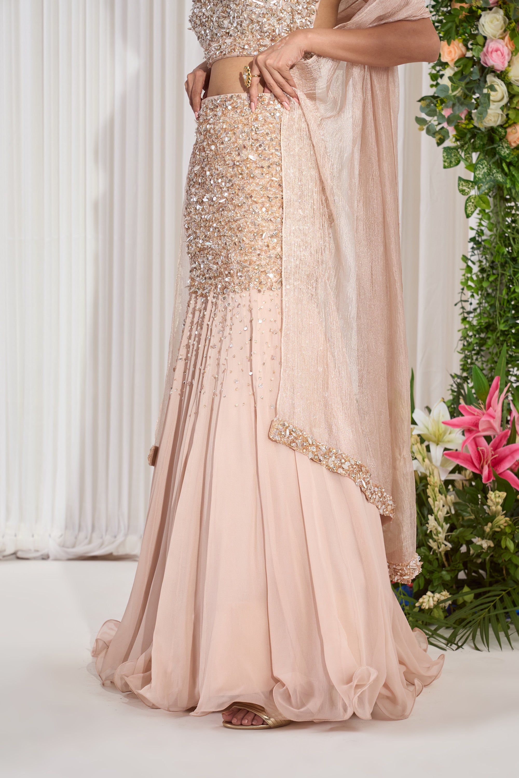 This fish cut lehenga set features intricate pearl, sequin and crystal  embroidery on a powder peach net base. The ens… | Lehenga, New blouse  designs, Pretty outfits